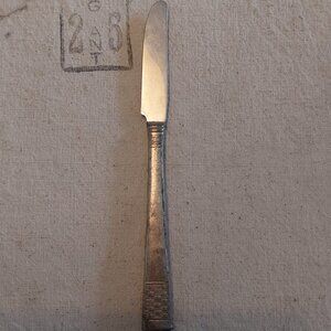 Vintage NS Co Silver plate knife with basket pattern handle